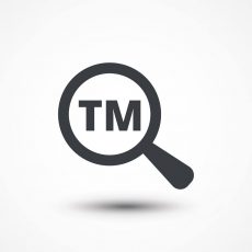 generic pic of magnifying glass over the TM symbol