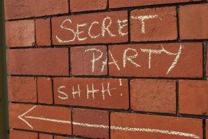 graffiti saying "Secret Party, shhh"