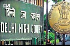 An image of the board in front of the High Court building which reads as Delhi High Court