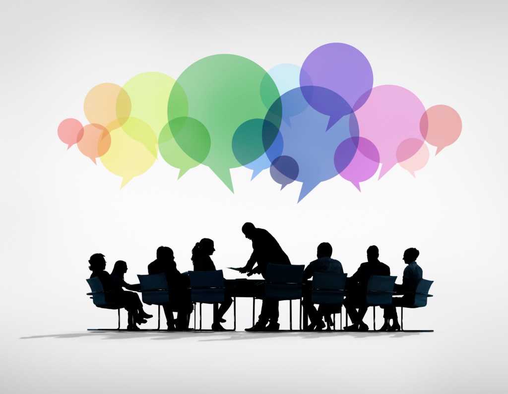Image of discussion among silhouettes  with colourful thought bubbles on top. 